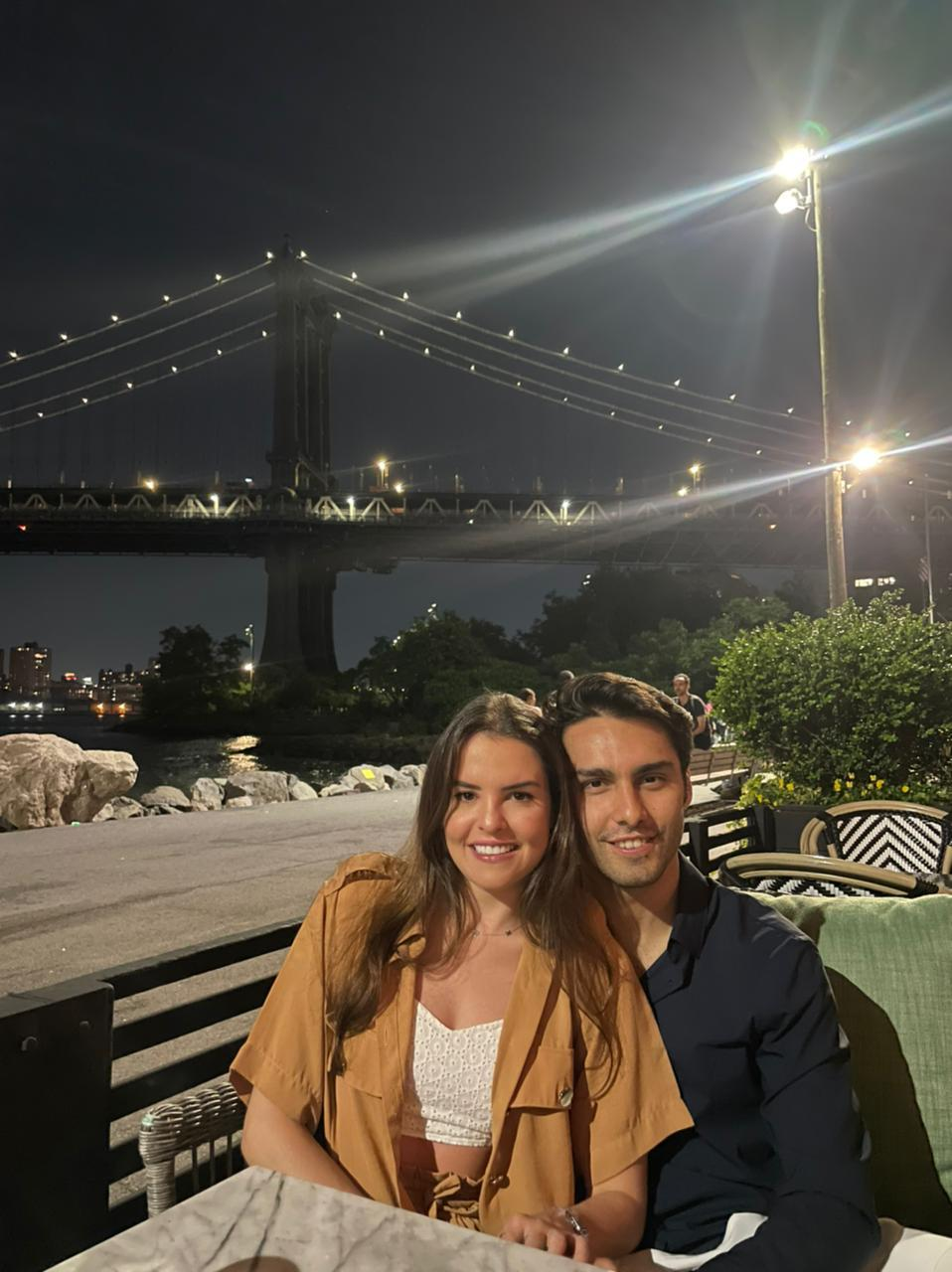 Couple photo by bridge at night