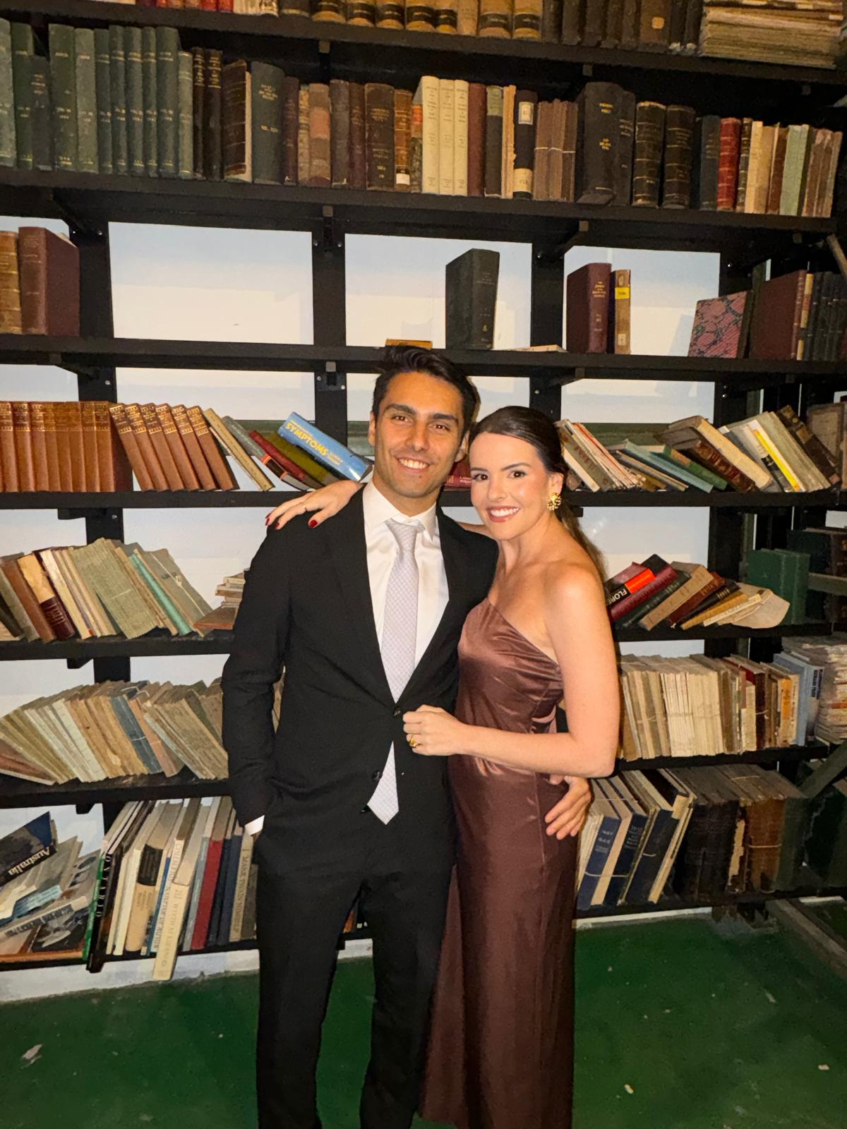 Elegant couple photo in library setting